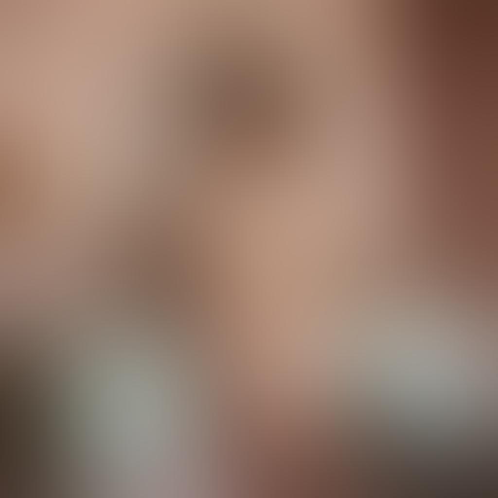 A stylish and elegant display of various women's intimate wear including lace bras, satin camisoles, and seamless panties, arranged artfully on a vintage dressing table. Soft, diffused lighting highlights the textures and intricate details of the fabrics, with a full-length mirror reflecting the silhouette of a confident woman in stylish, contemporary pose. A dreamy, ethereal backdrop with pastel colors enhances the intimacy of the setting. soft focus. vibrant colors. 3D.